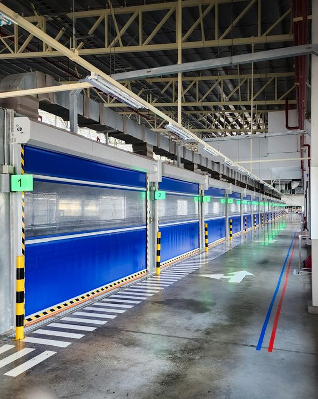 High-speed industrial door installation at Perodua automotive manufacturing facility in Malaysia