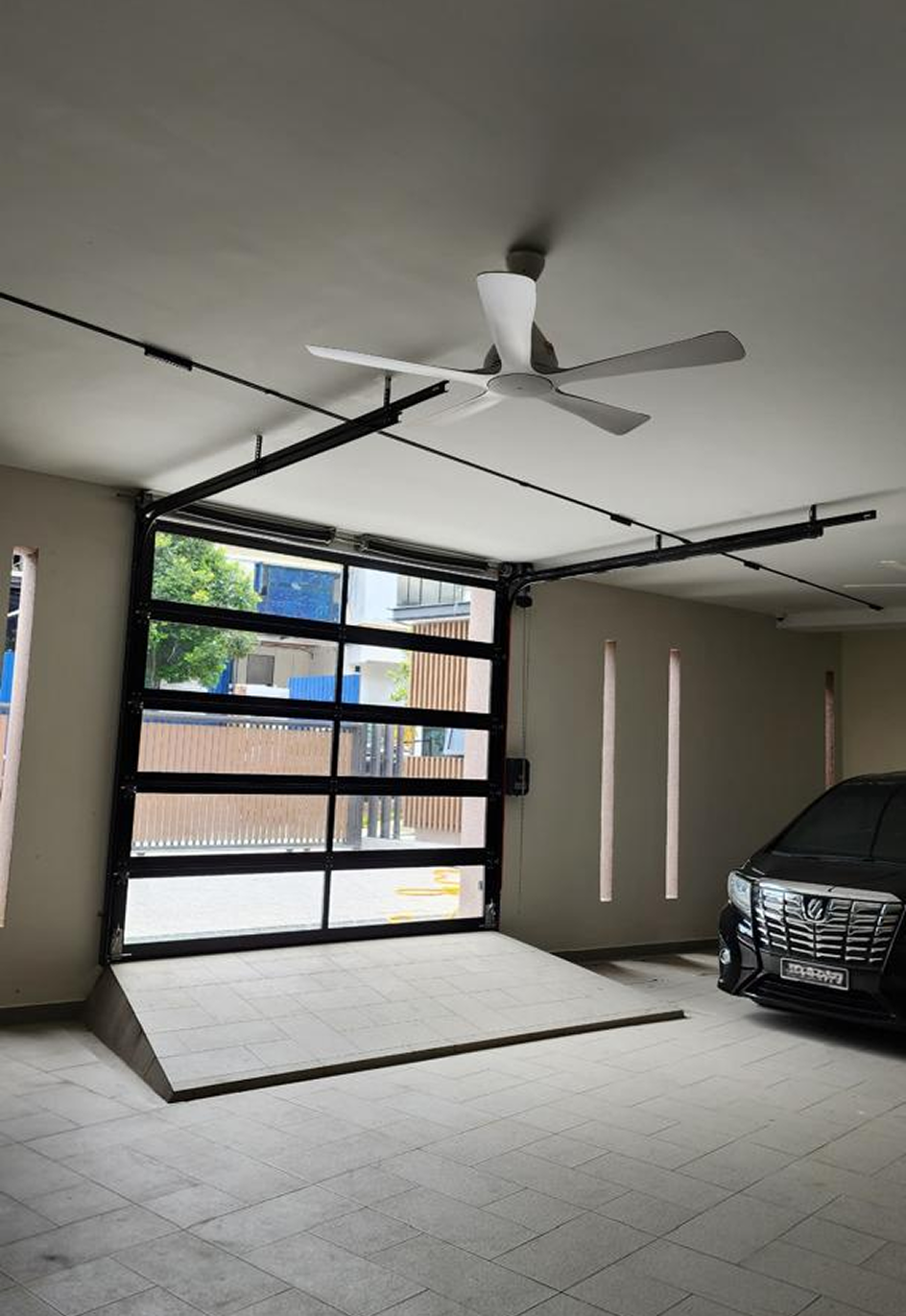 Residential garage workshop with sectional garage door