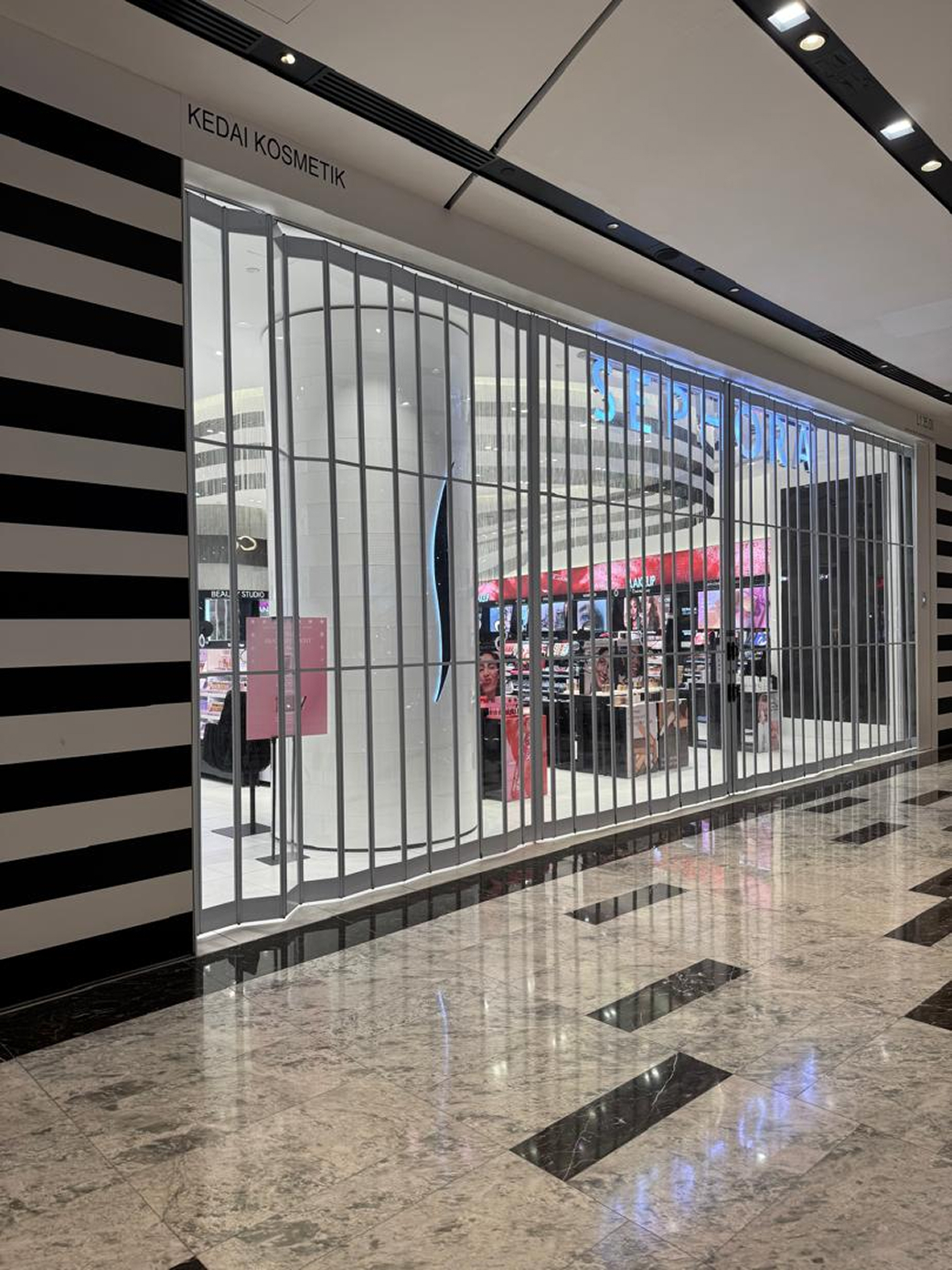 Folding door system installed at Sephora beauty retail store for storefront access Malaysia